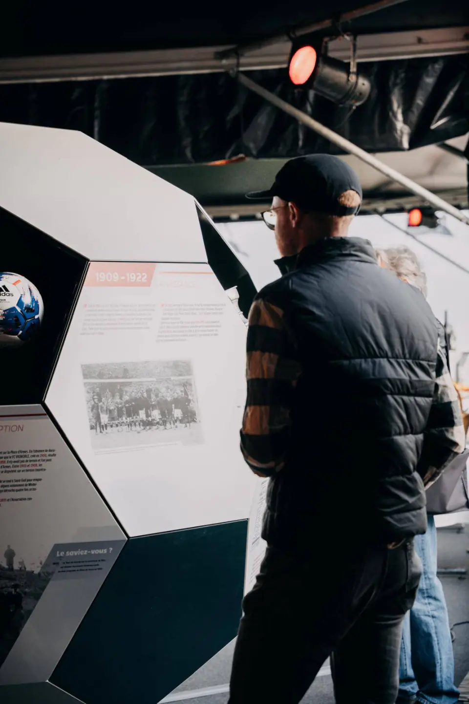 Visitor looking at the panels of the balloon-exhibition